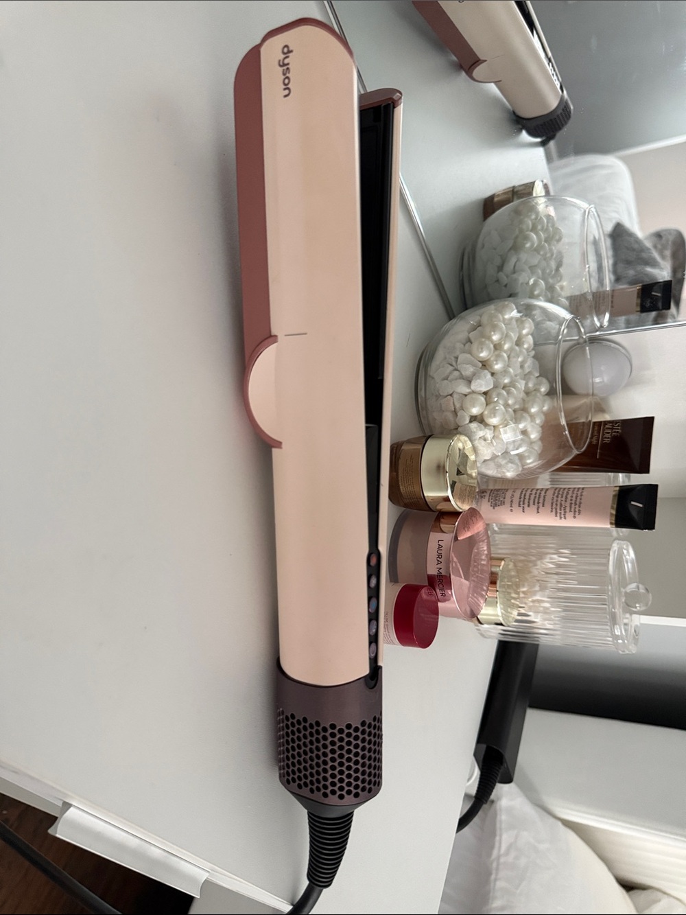Dyson hair straightener in blush and rose gold